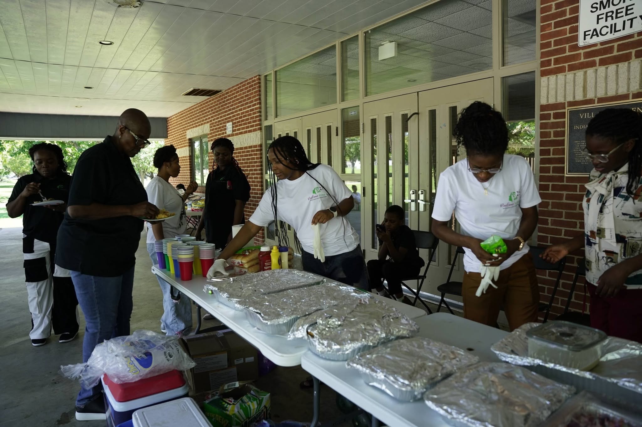 Resilience Rebirth team preparing food at community event